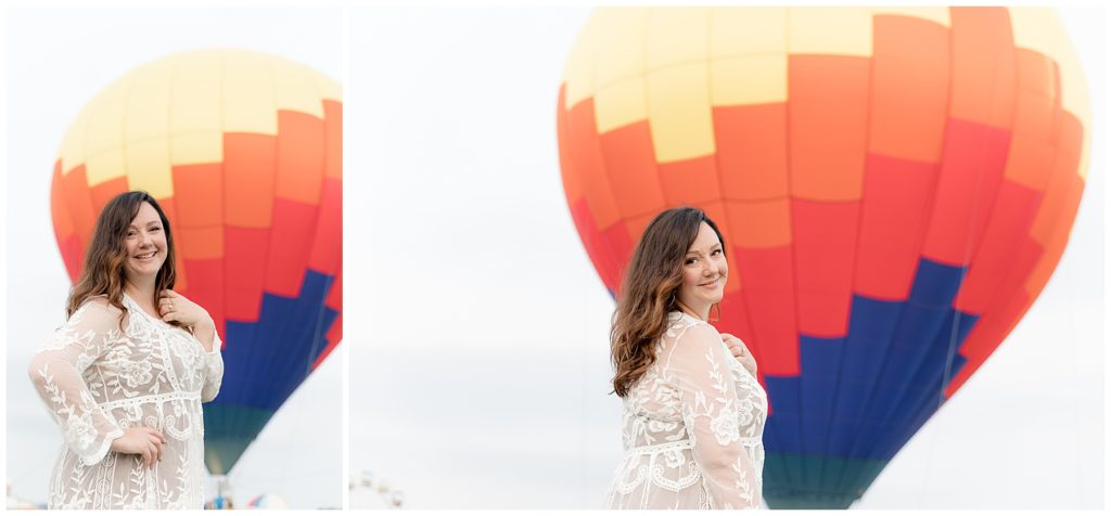 woman stands in front of hot air balloons at Howard County festival