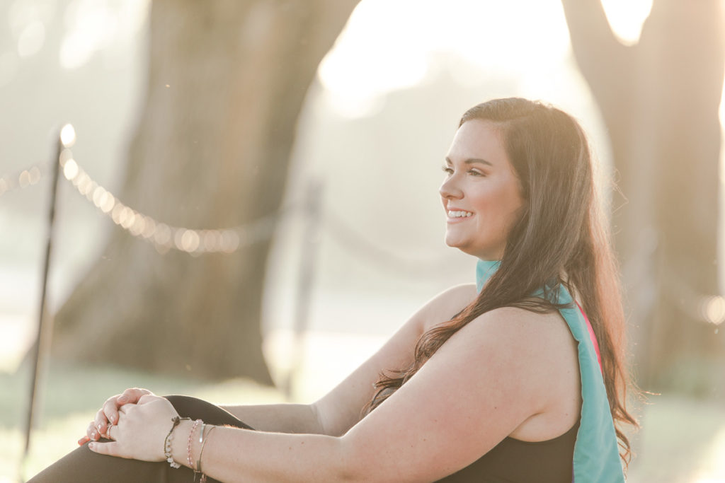 Beautiful light shines on woman during her grad photos in DC
