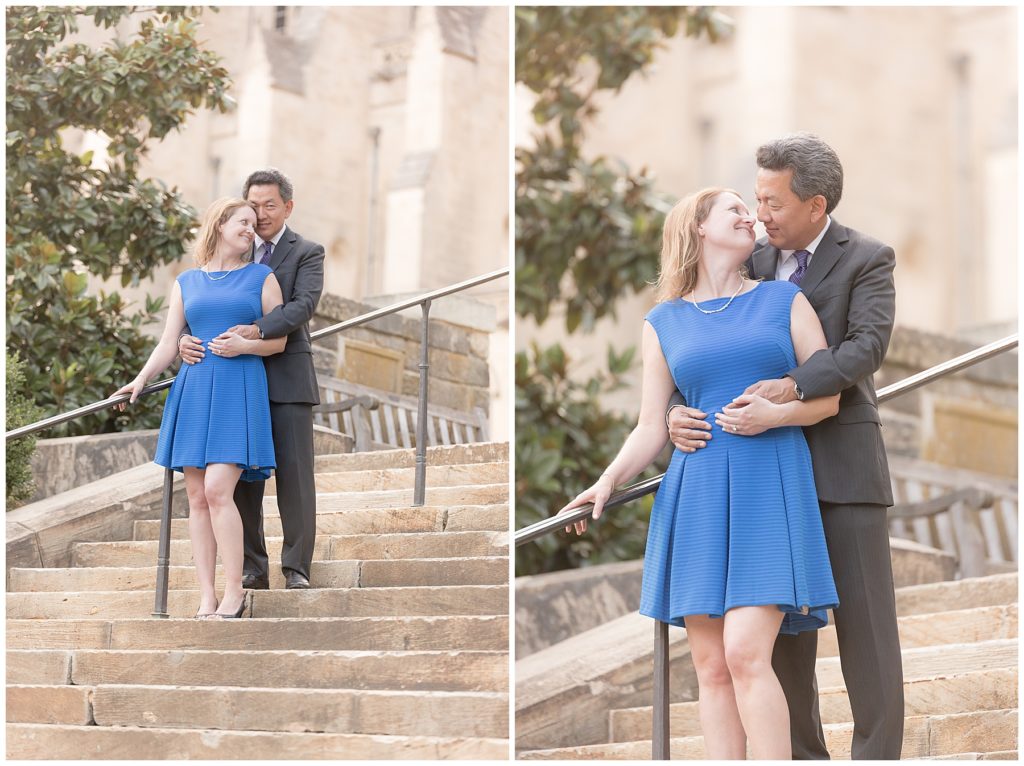 Couple stands on stairs at National Cathedral