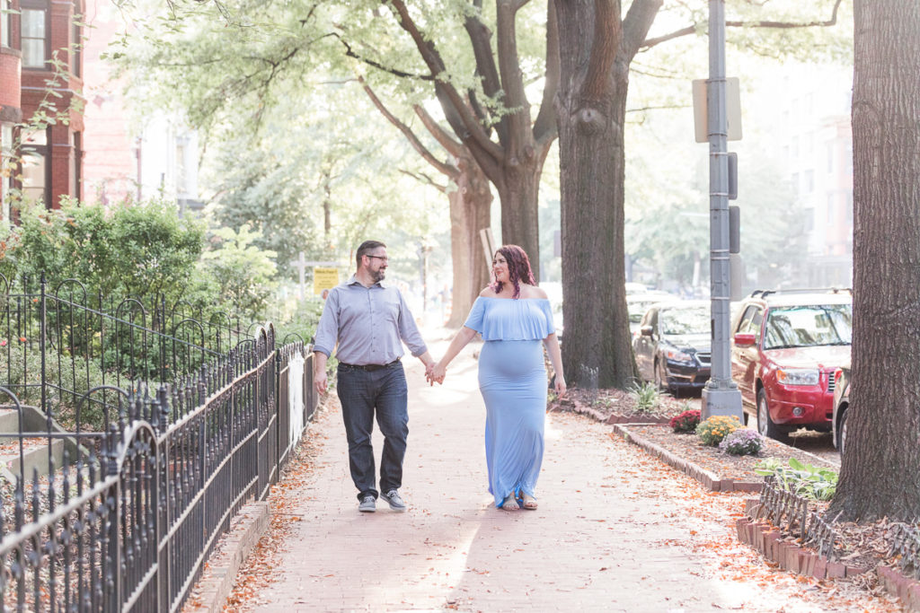 couple strolls through DC neighborhood