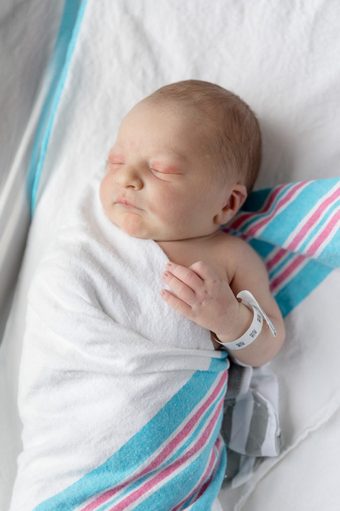 capturing newborn photos right after birth