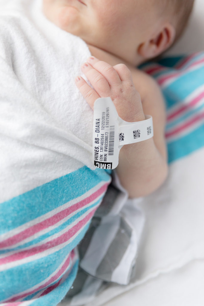 closeup of hospital ID band on baby's wrist