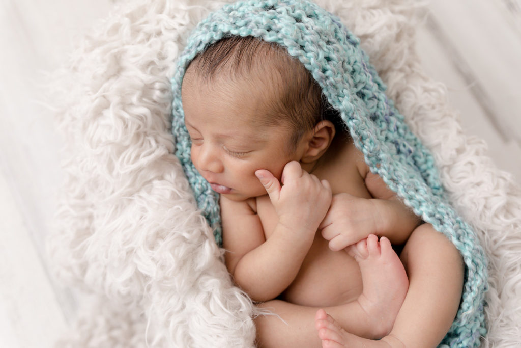 teal and white newborn styling