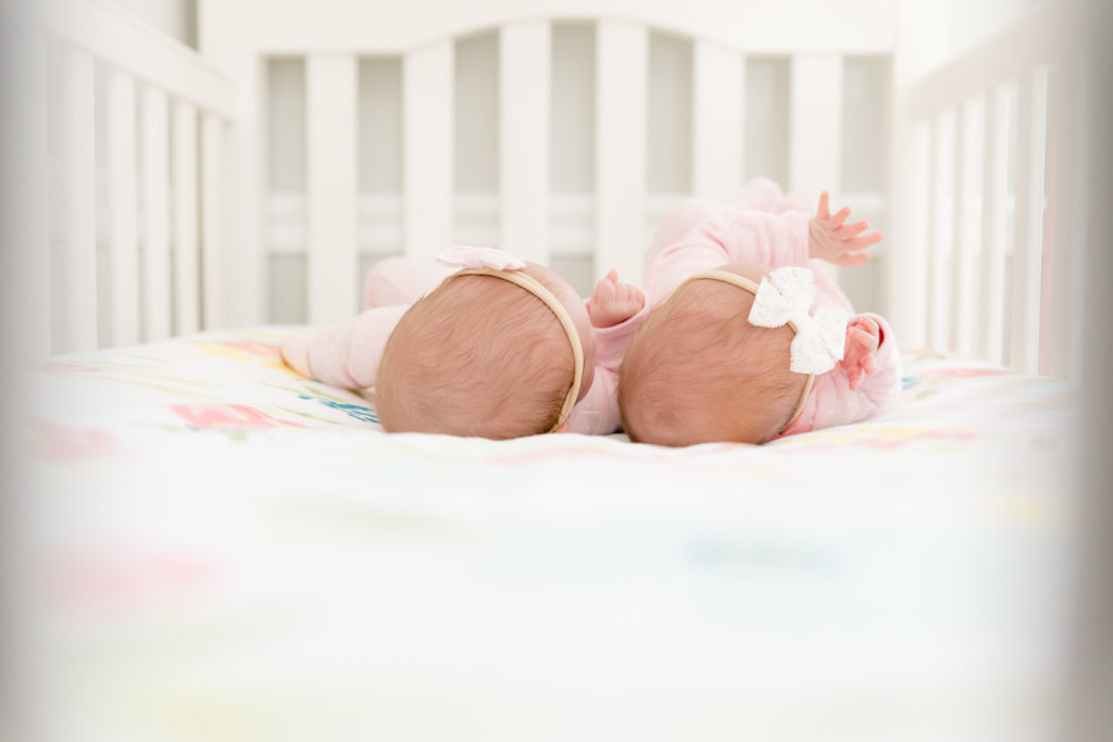 newborn twin session crib shot