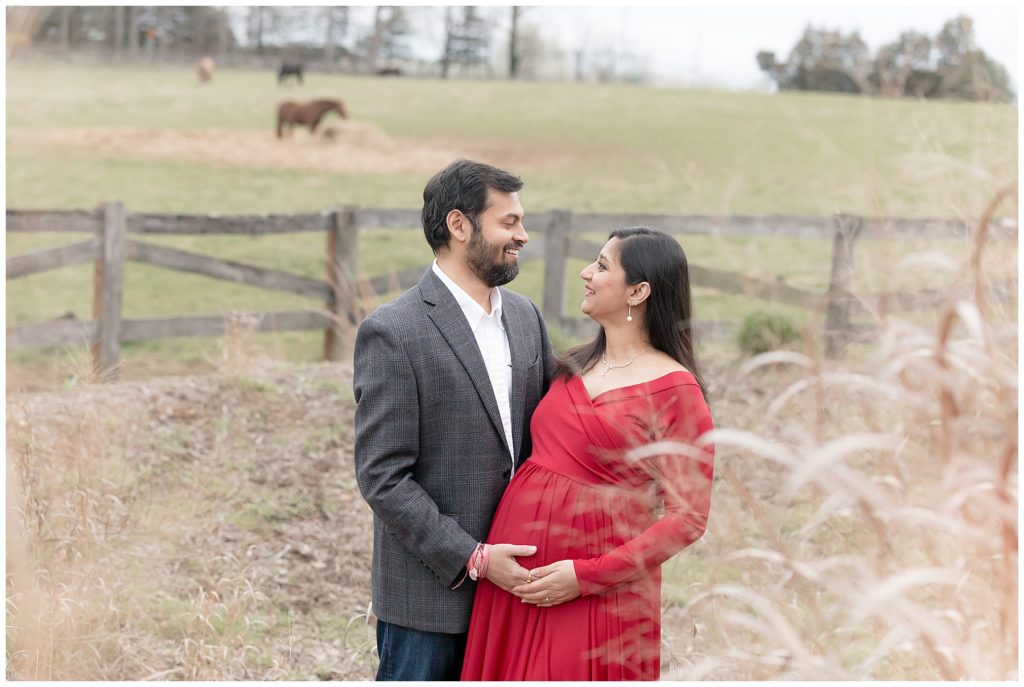 pregnancy photos, red maternity dress, horse field