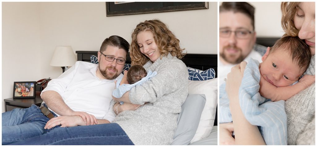 parents snuggle new son on master bed