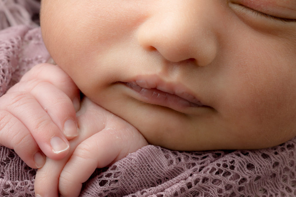 newborn lips and hands