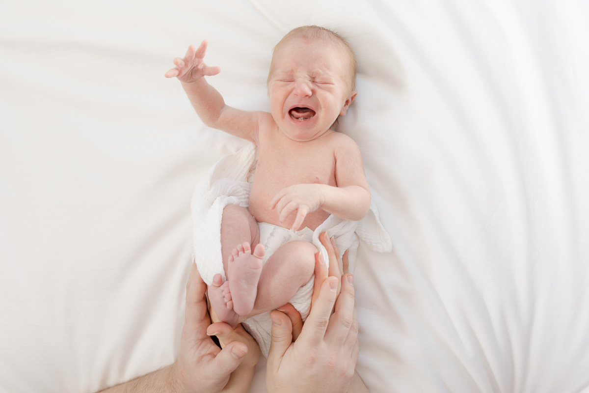 catching newborn cries, giving newborn photos as a gift