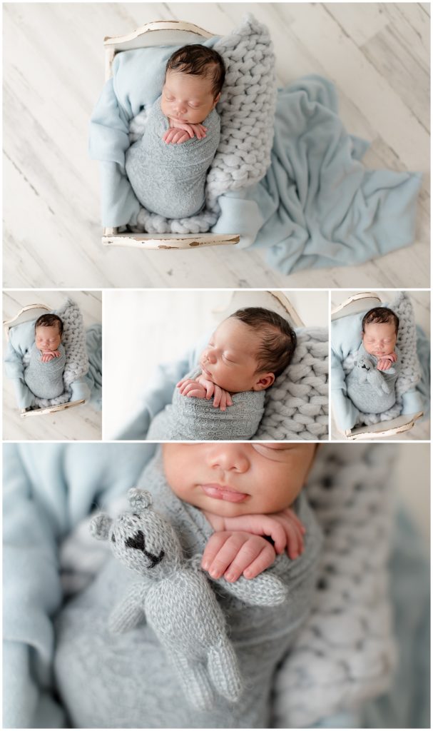 newborn baby boy in blue with message to be kind to one another