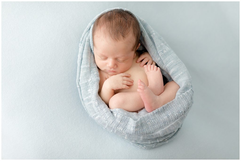squishy egg wrap newborn pose