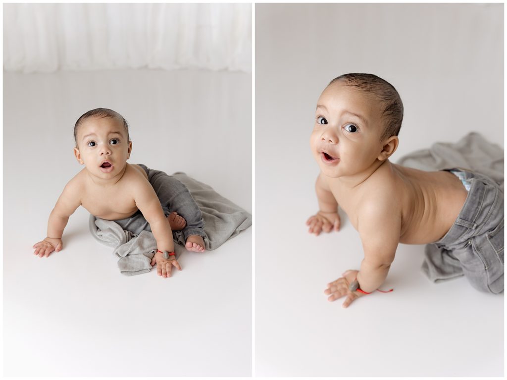 six month baby photos on white flooring