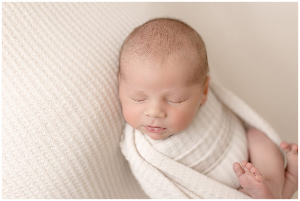 sleeping newborn in Burtonsville photo studio