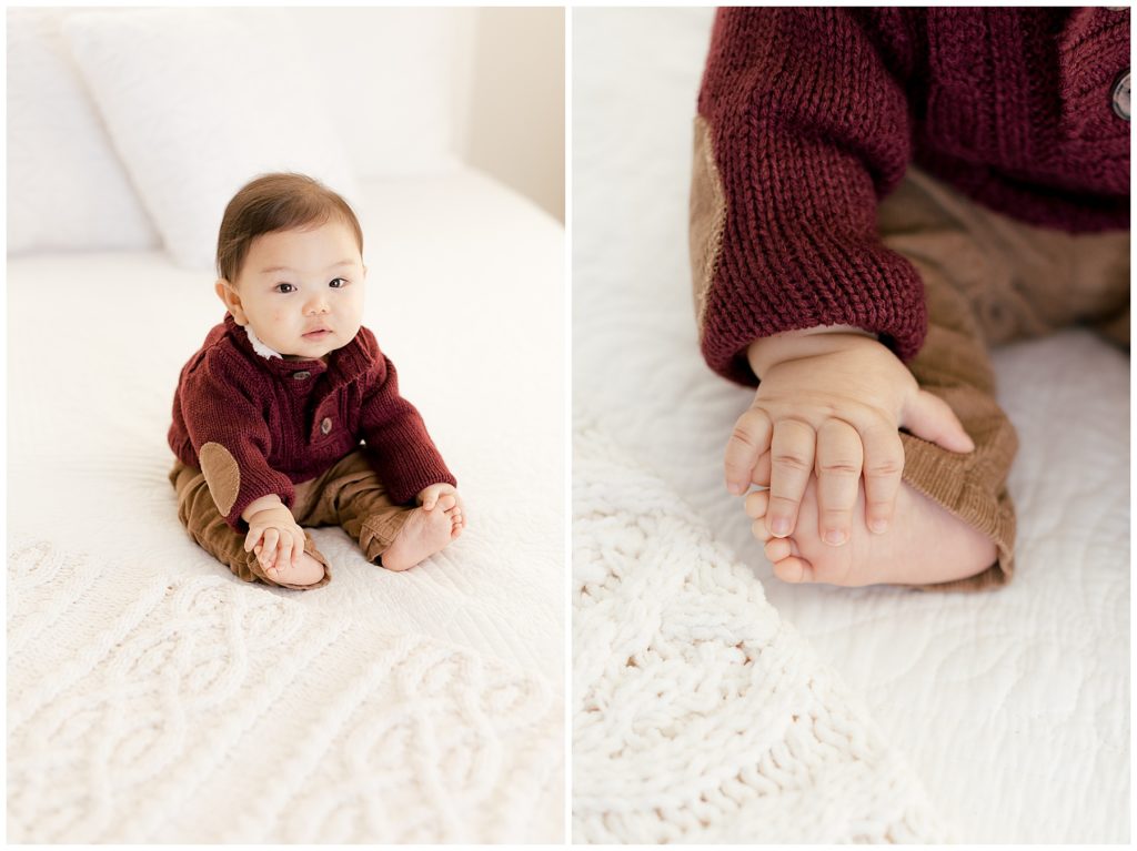 baby boy grabs his toes during baby portrait sessions