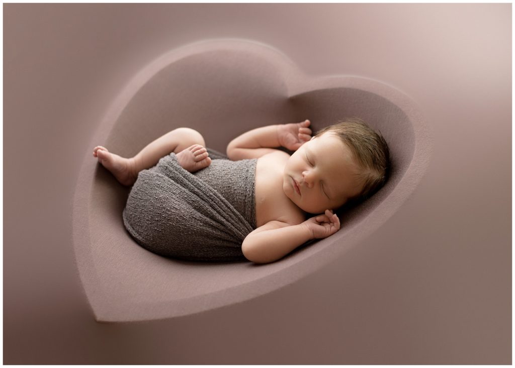 posed newborns in studio, heart bowl