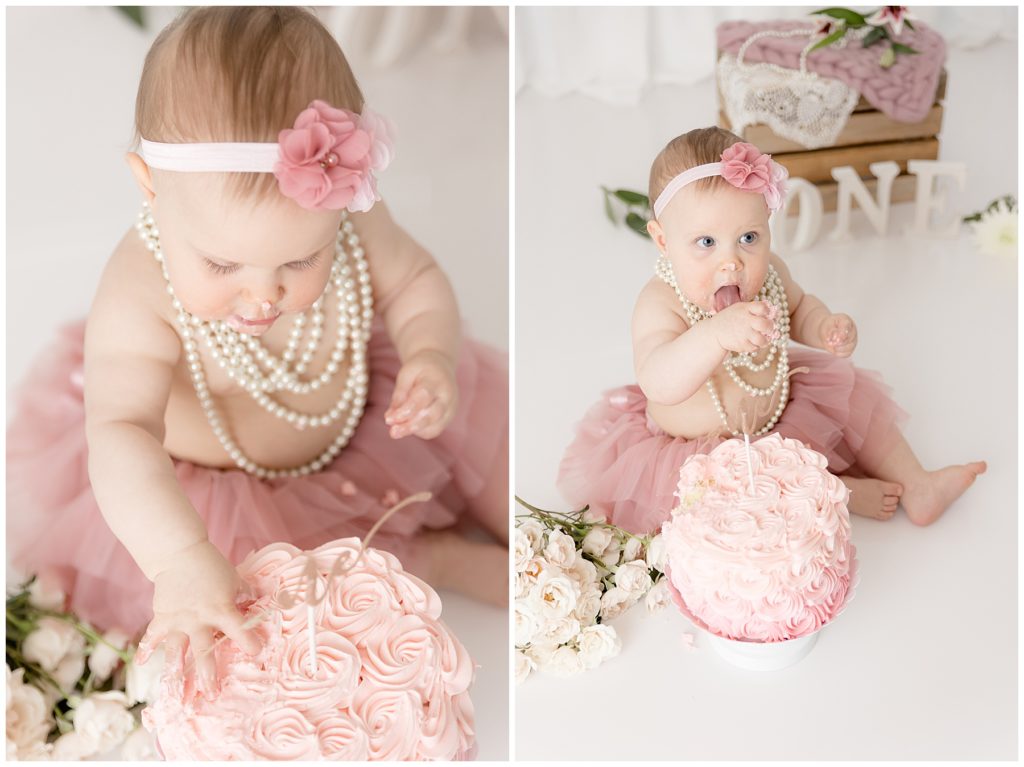 baby eats cake in pearls and pink tutu