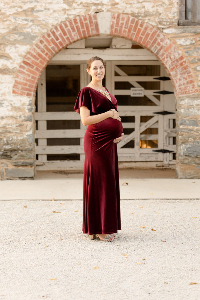 maternity photos in merlot dress