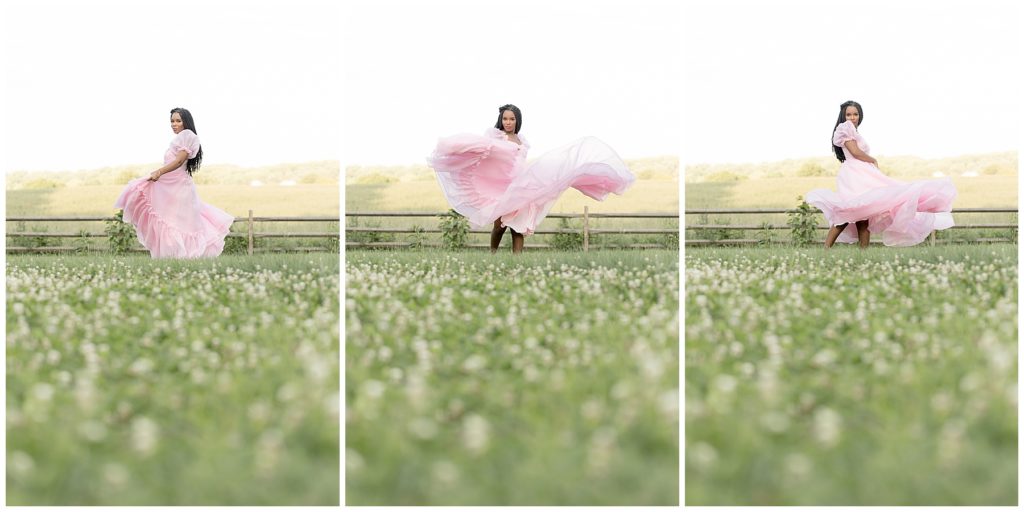 showing off pink poofy dress in green field