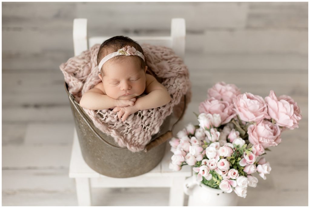 newborn bucket shot with flowers