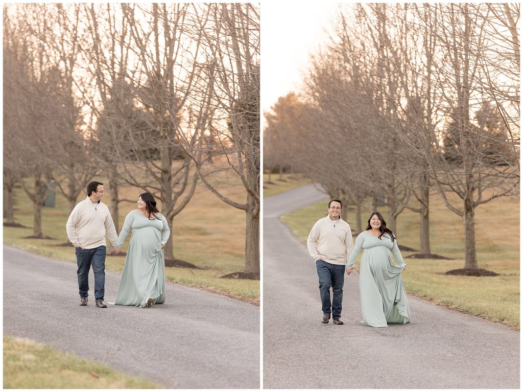 expectant couple walks down driveway