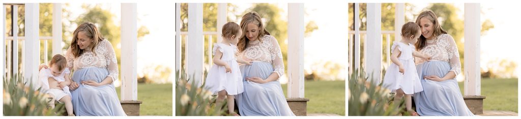cuddles with toddler during maternity photo session