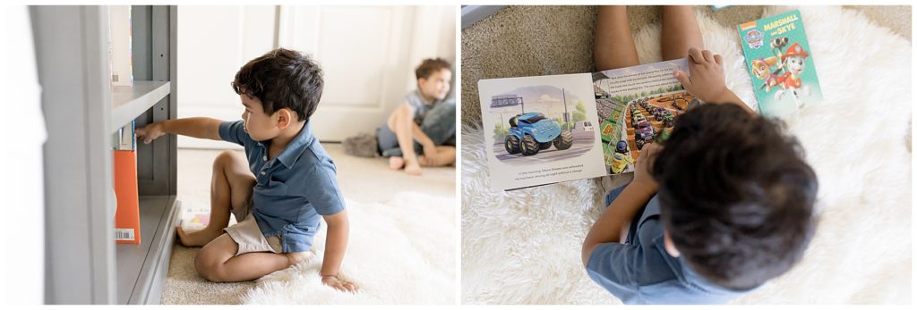 in home newborn session - big brothers are entertained by books