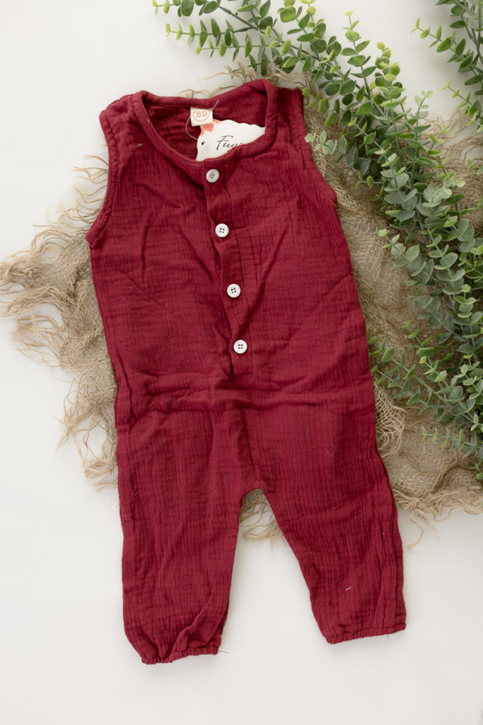 red sleeveless romper - props and outfits