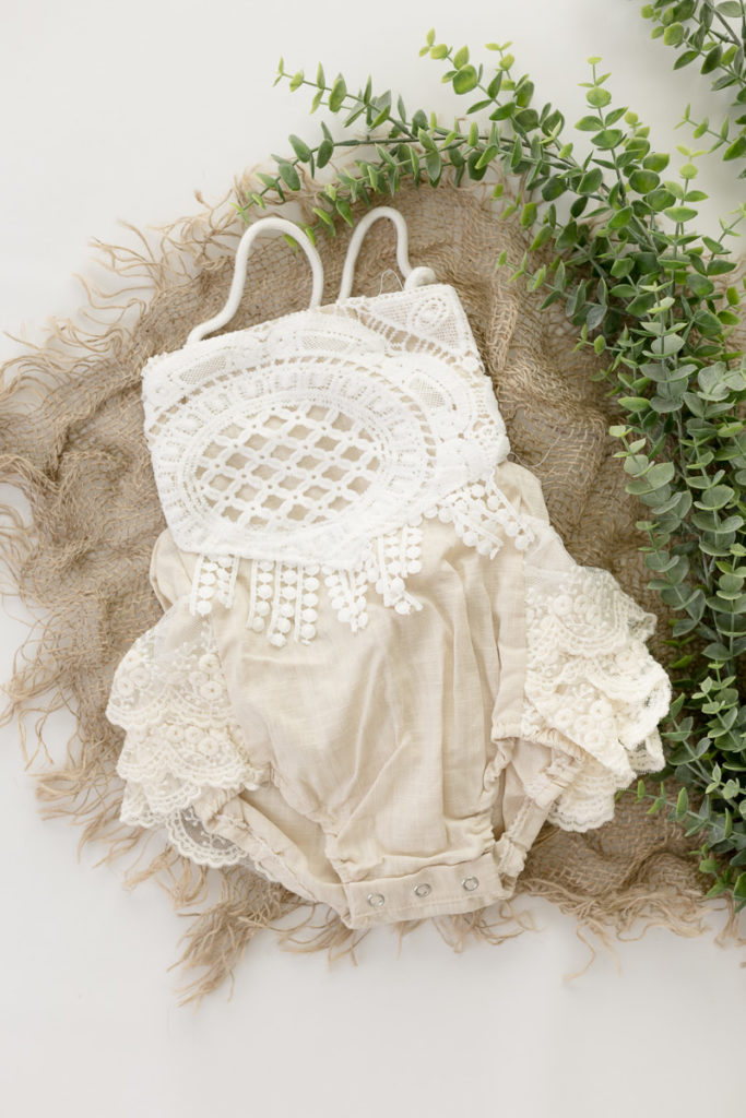 cream and white lace romper - props and outfits