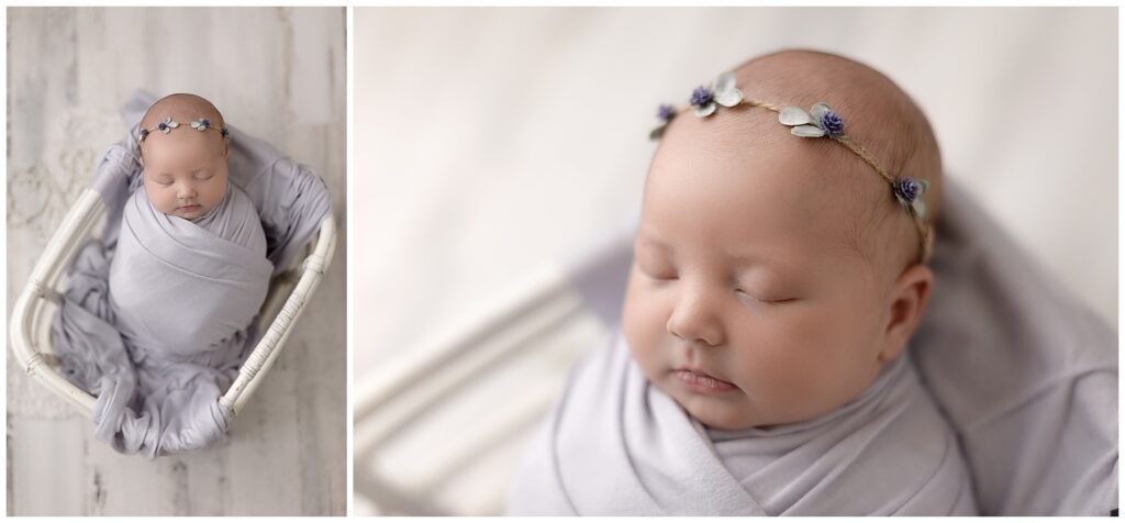 baby girl in blue/white basket with blue flower headband