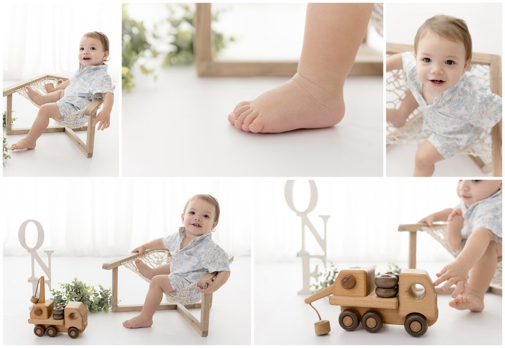 First year portraits in the hammock chair with a vintage wooden truck and letters that spell out ONE as simple decor
