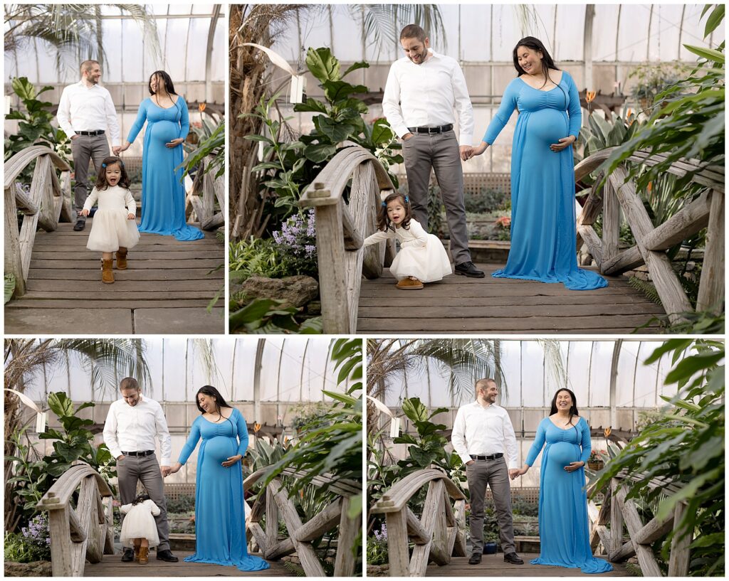 This family of three poses for maternity photos on this curved footbridge to immortalize the beauty of pregnancy.